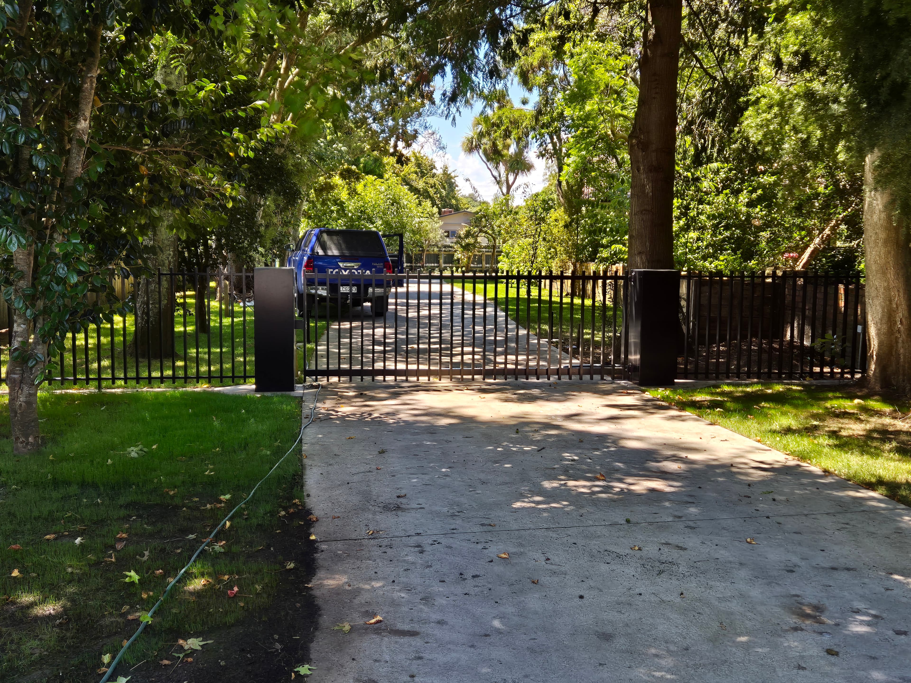 Modern swing gate across a Whanganui driveway