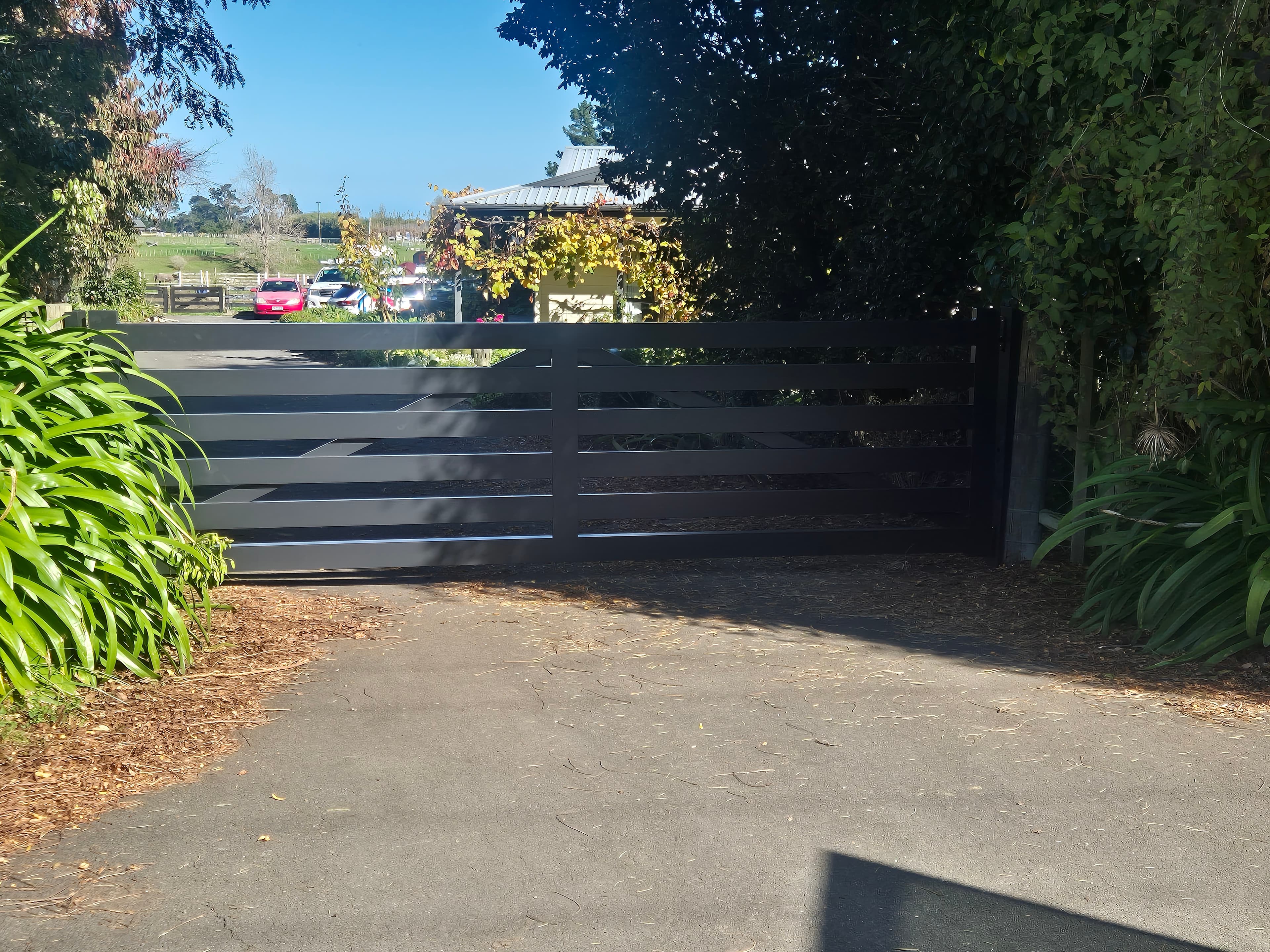 Charcoal slat gate at a Whanganui property